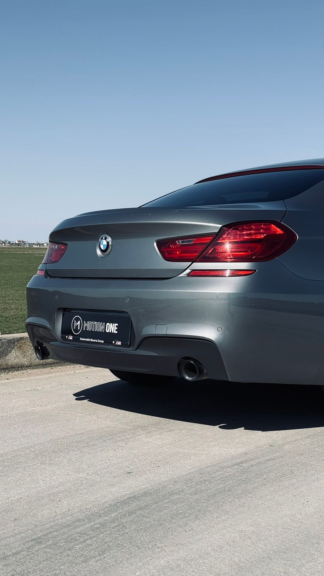 BMW Seria 6 Gran Coupé gri, profil posterior