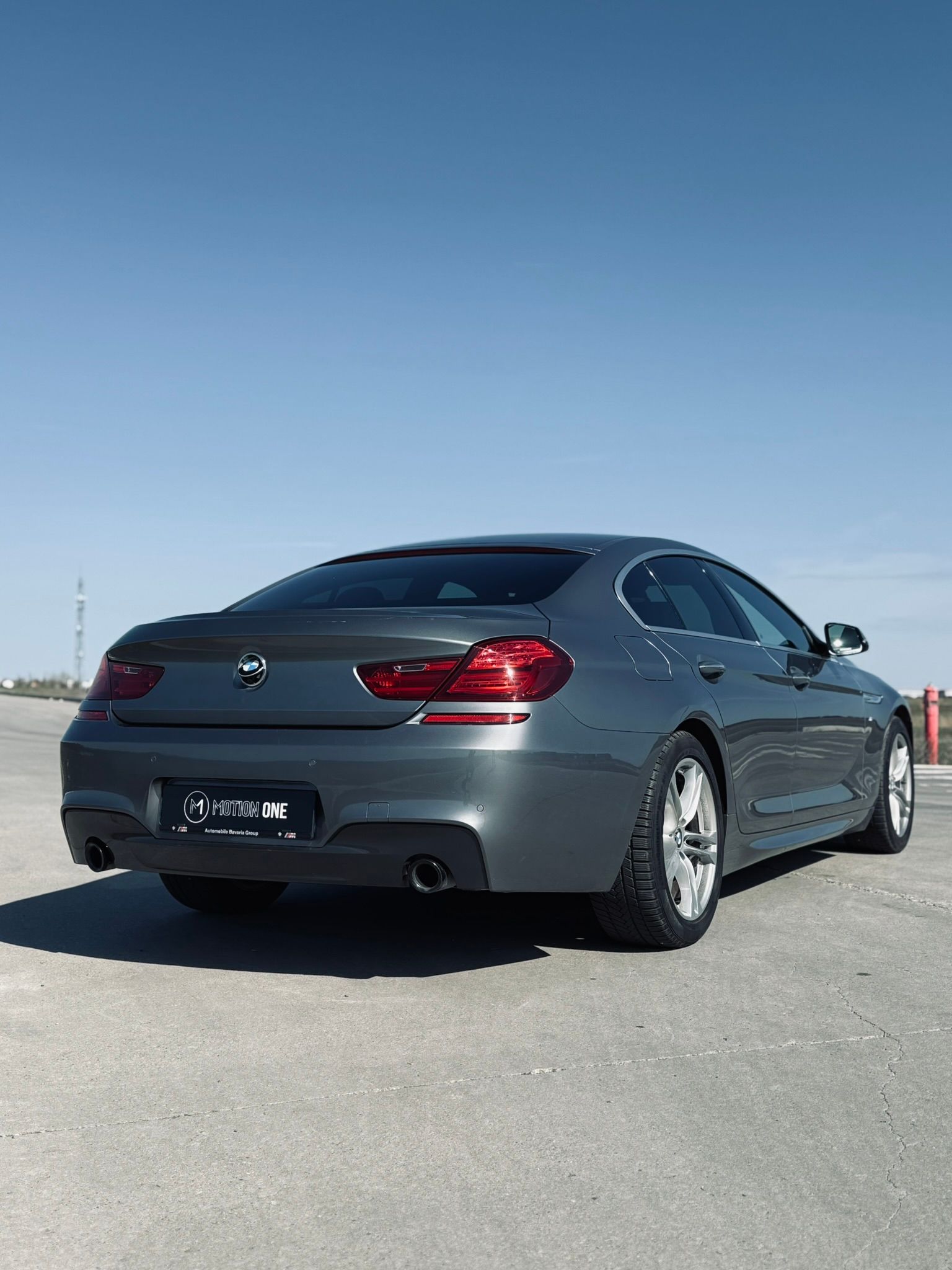 BMW Seria 6 Gran Coupé gri, spate trei sferturi